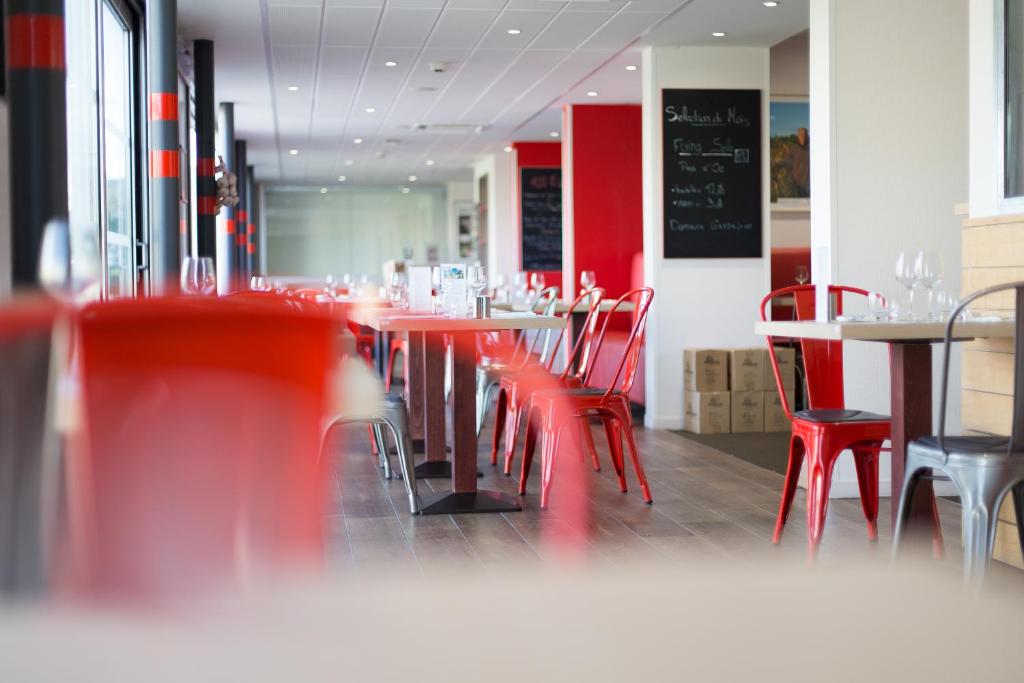 Veitingastaður eða matsölustaður á Brit Hotel Toulouse Colomiers – L’Esplanade