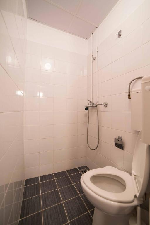 Kúpeľňa v ubytovaní Tempi Hotel