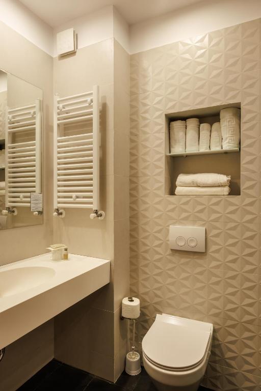 Koupelna v ubytování Hotel Amiral