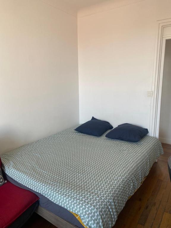 Postel nebo postele na pokoji v ubytování Chambre cosy et proche des sites Olympiques