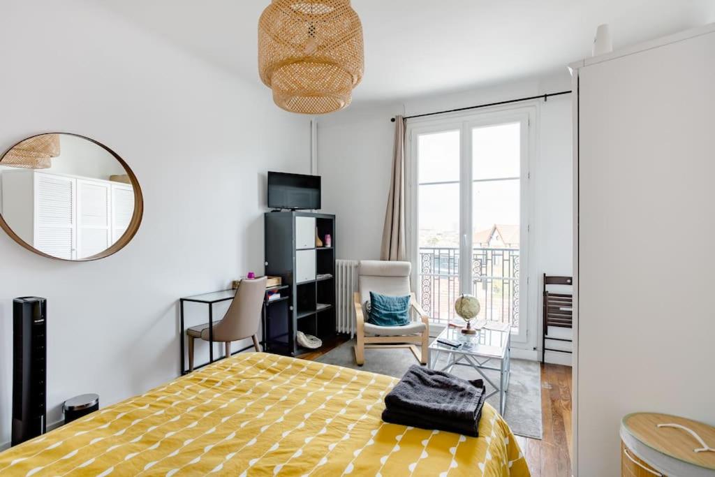 Postel nebo postele na pokoji v ubytování Chambre privative spacieuse proche de Paris centre et des sites Olympiques