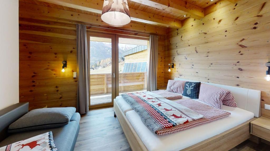 Postel nebo postele na pokoji v ubytování Chalet Traumblick