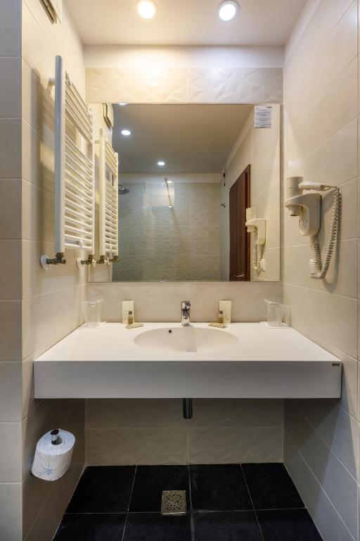 Koupelna v ubytování Hotel Comandor