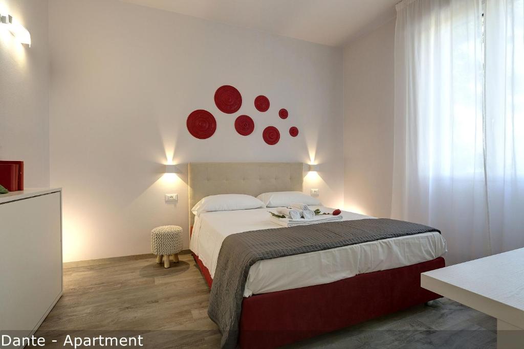 Posteľ alebo postele v izbe v ubytovaní Dante & Virgilio Apartments by Mamo Florence
