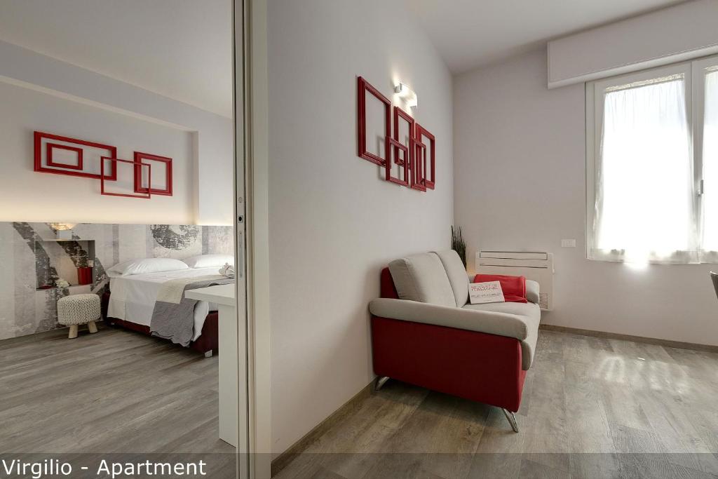 Posteľ alebo postele v izbe v ubytovaní Dante & Virgilio Apartments by Mamo Florence