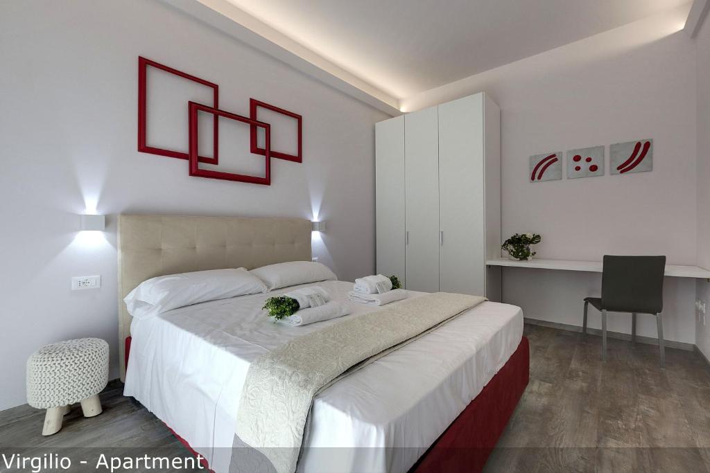 Posteľ alebo postele v izbe v ubytovaní Dante & Virgilio Apartments by Mamo Florence