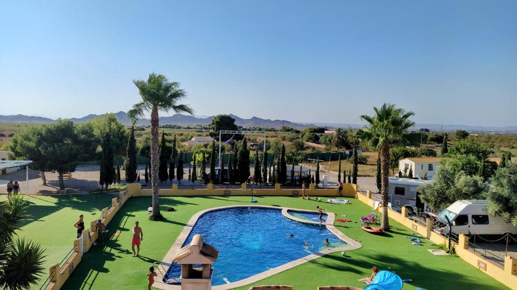 The swimming pool at or close to Espacio Finca Alegría - Rural Houses, Hostel, Campsite & Wellness Center
