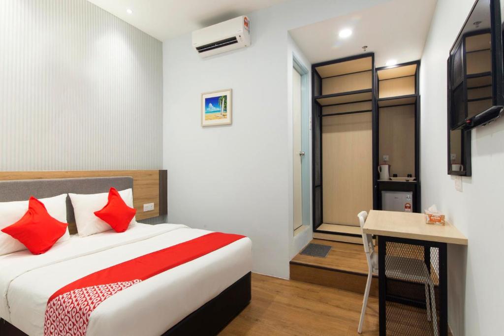 Postel nebo postele na pokoji v ubytování Agape Hotel Selayang