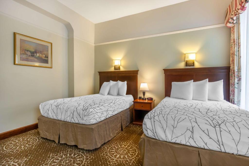 Best Western Plus Pioneer Square Hotel Downtownにあるベッド