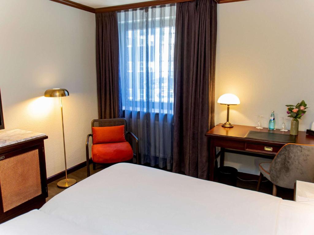 Postel nebo postele na pokoji v ubytování Mercure Hotel Frankfurt Airport Langen