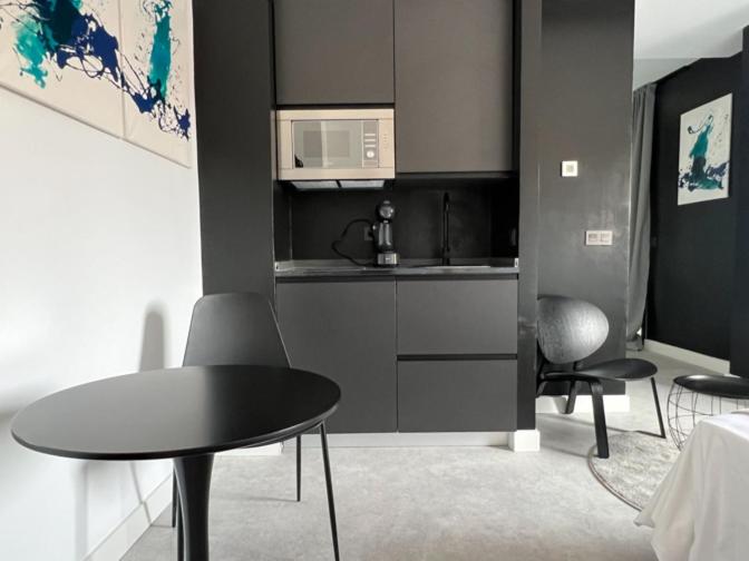 Kuchyň nebo kuchyňský kout v ubytování Innova Spaces Málaga