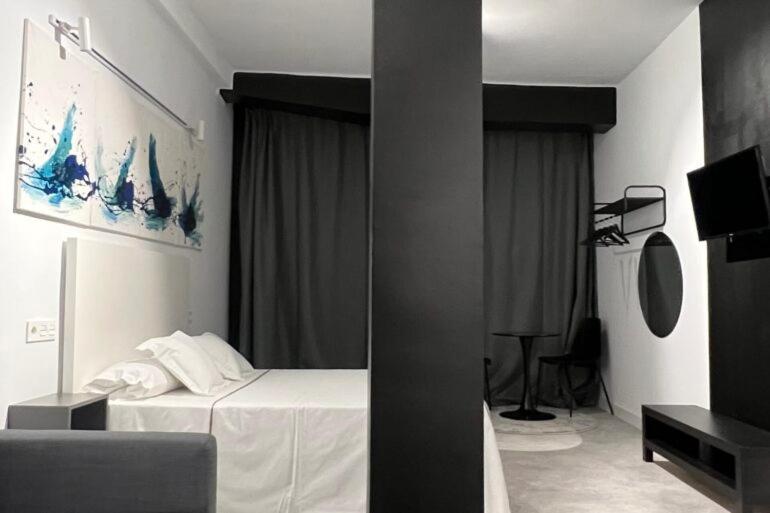 Postel nebo postele na pokoji v ubytování Innova Spaces Málaga