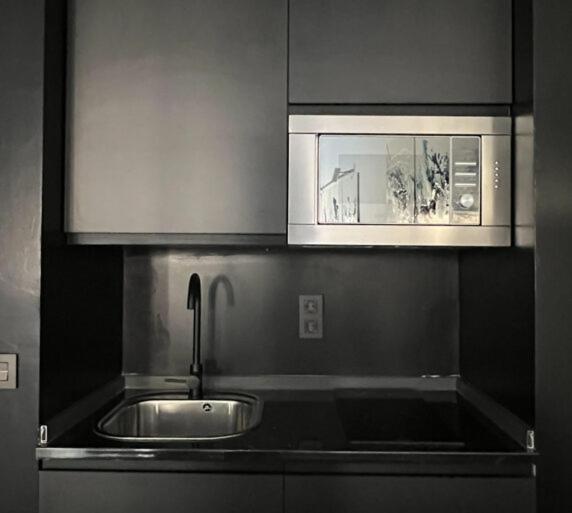 Kuchyň nebo kuchyňský kout v ubytování Innova Spaces Málaga
