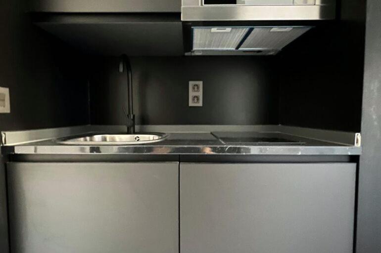 Kuchyň nebo kuchyňský kout v ubytování Innova Spaces Málaga