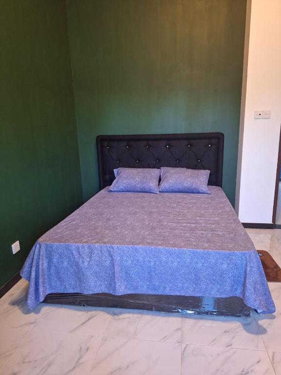 Postel nebo postele na pokoji v ubytování Royal Villa