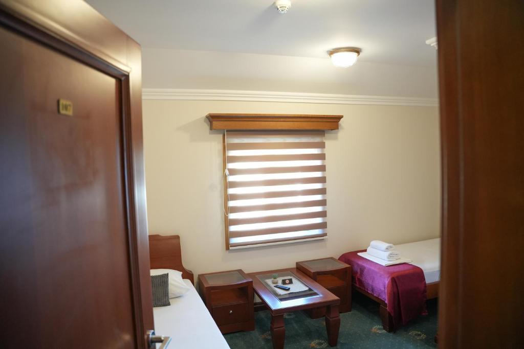 Postel nebo postele na pokoji v ubytování Comfort Lodge