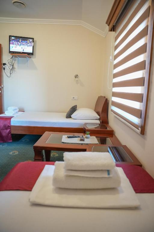 Postel nebo postele na pokoji v ubytování Comfort Lodge