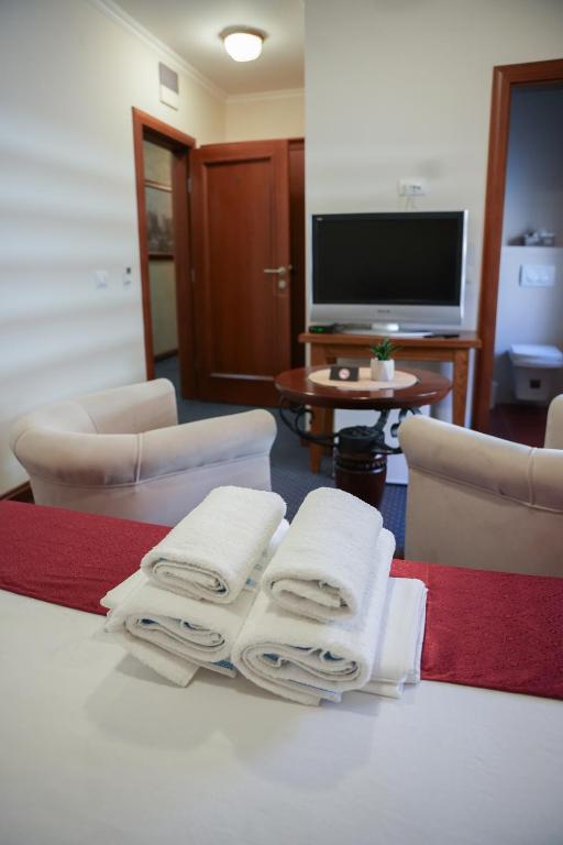 TV a/nebo společenská místnost v ubytování Comfort Lodge