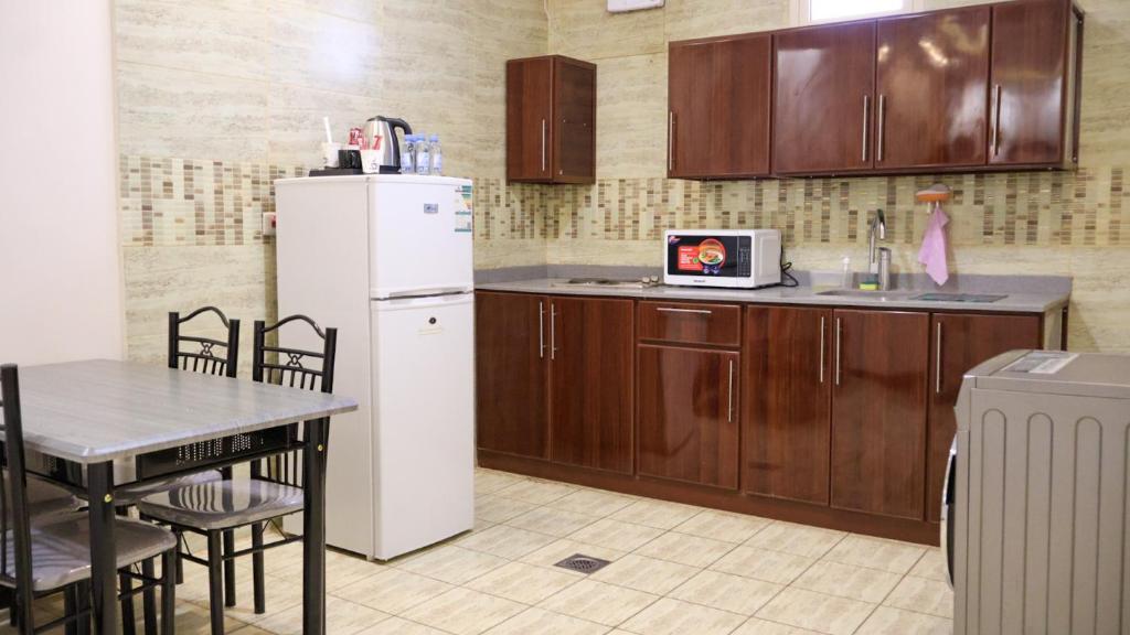 Kuchyň nebo kuchyňský kout v ubytování Tamyoz Aparthotel 2
