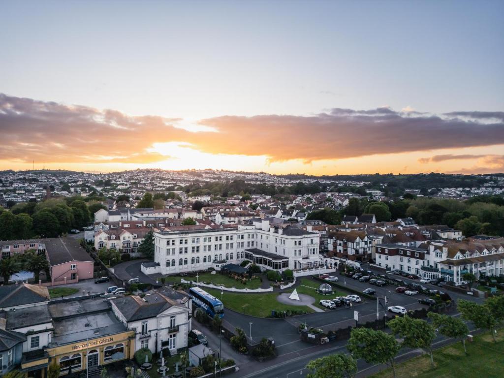 an aerial view of a city at sunset at The Palace Hotel in Paignton