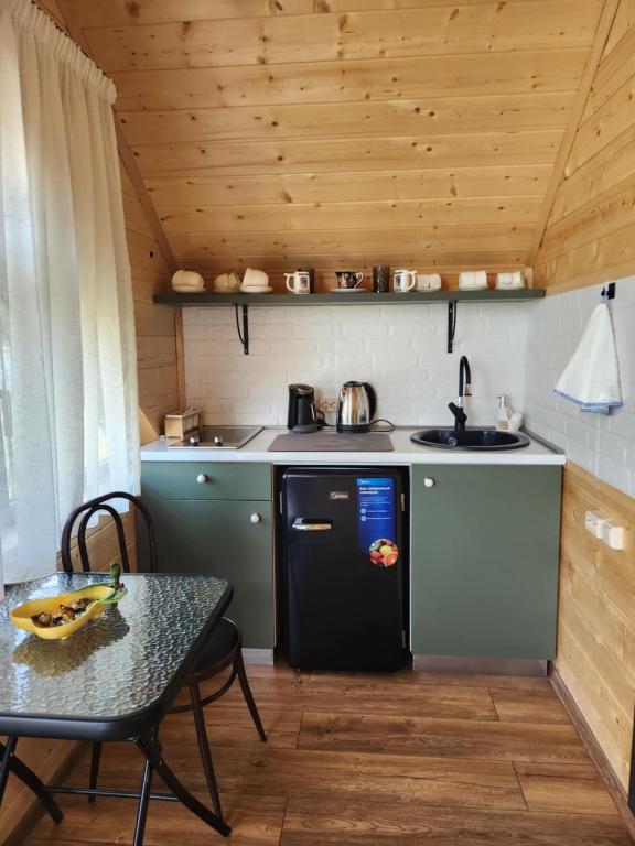 Kuchyň nebo kuchyňský kout v ubytování Cottage Liantto