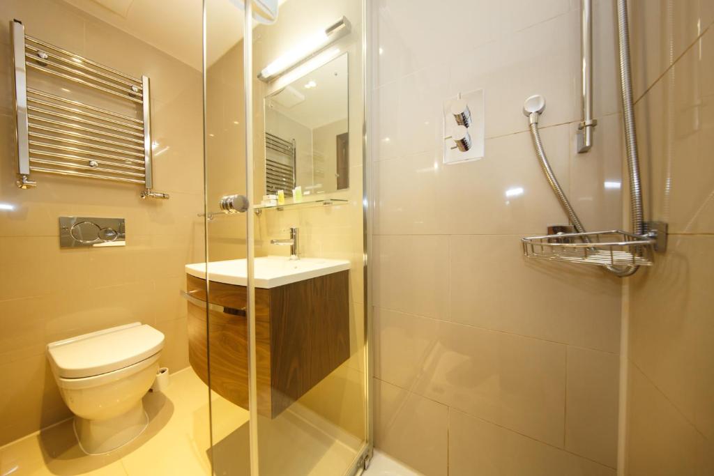 Koupelna v ubytování Regency House Hotel