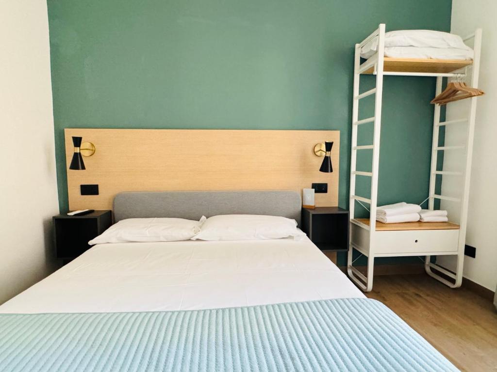 Postel nebo postele na pokoji v ubytování My Maison Italy GuestHouse