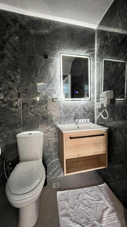 Koupelna v ubytování Hotel Davids