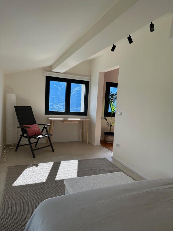 Postel nebo postele na pokoji v ubytování Villa D'ALBA guest house