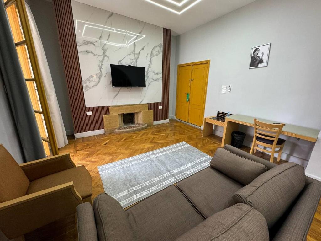 TV a/nebo společenská místnost v ubytování Zamalek House Hotel