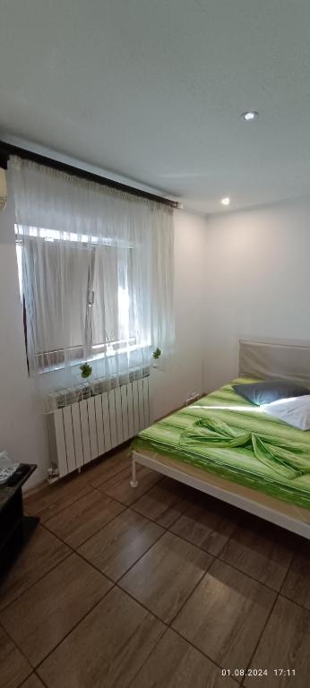 Postel nebo postele na pokoji v ubytování Casa MILLY Constanta