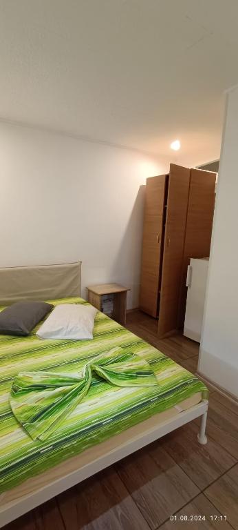 Postel nebo postele na pokoji v ubytování Casa MILLY Constanta