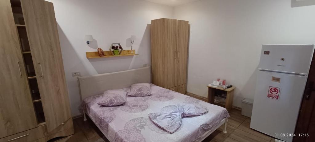 Postel nebo postele na pokoji v ubytování Casa MILLY Constanta