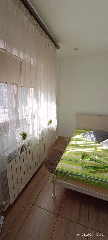 Postel nebo postele na pokoji v ubytování Casa MILLY Constanta
