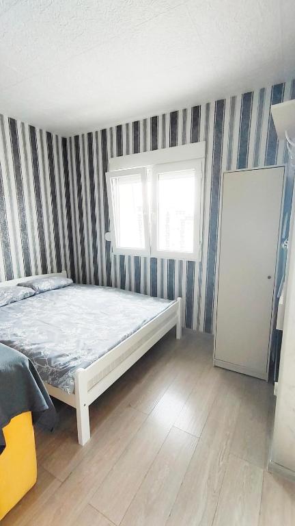 Letto o letti in una camera di Good Inn