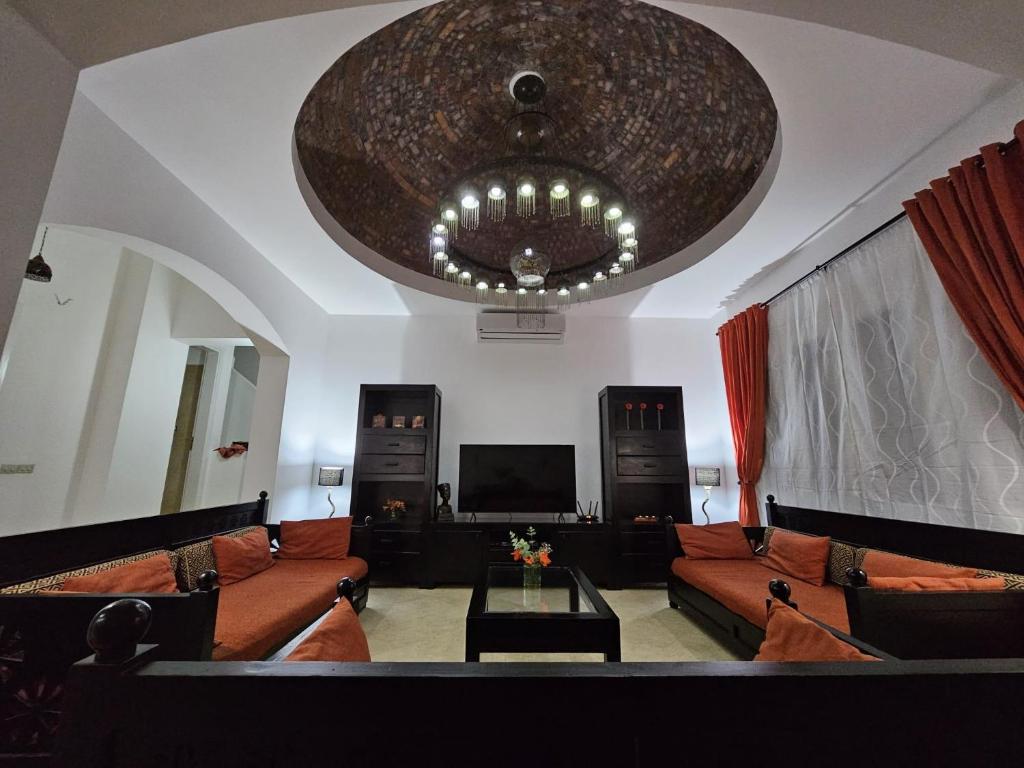 A television and/or entertainment centre at Extremely Private Villa with Optional Pool Heating