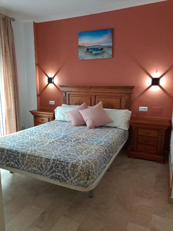 Postel nebo postele na pokoji v ubytování Hostal Montys