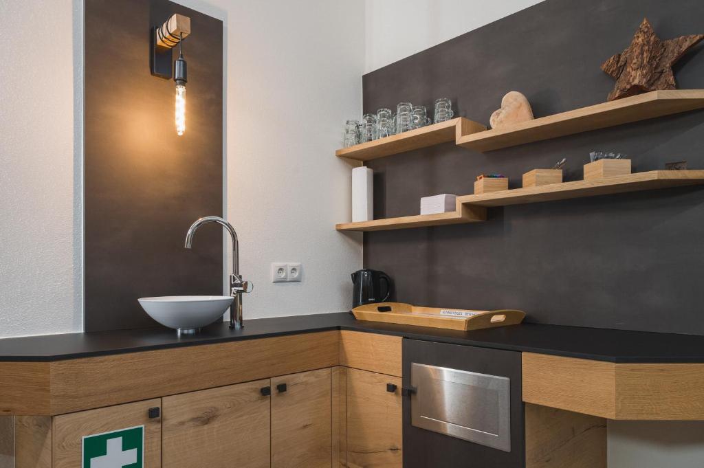 Kuchyň nebo kuchyňský kout v ubytování ad-fontanas Appartements Vandans