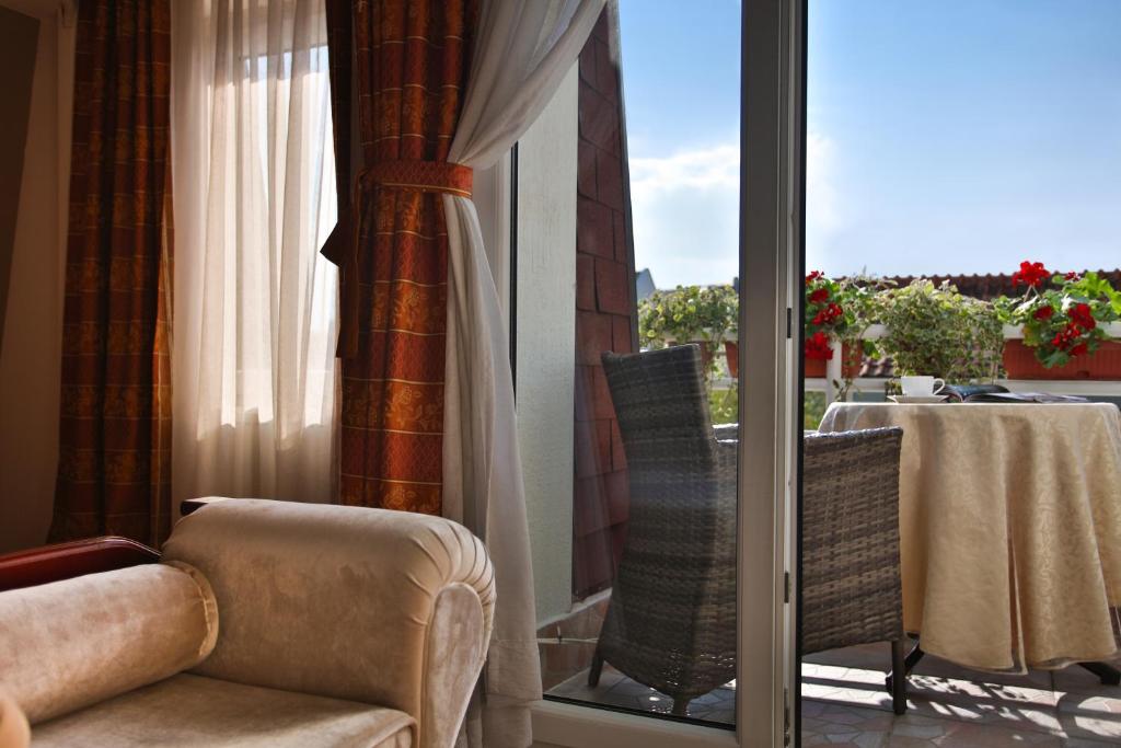 Posezení v ubytování Garni Hotel President de Luxe