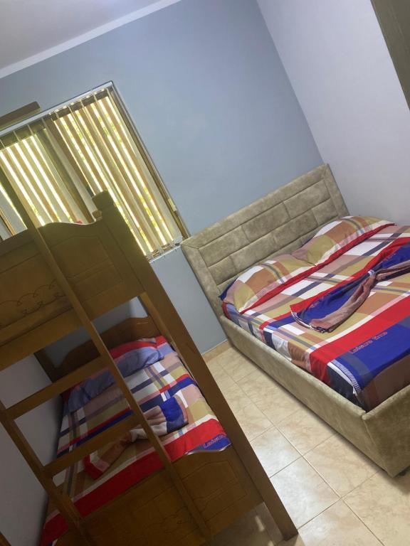 Кровать или кровати в номере VOD Apartments
