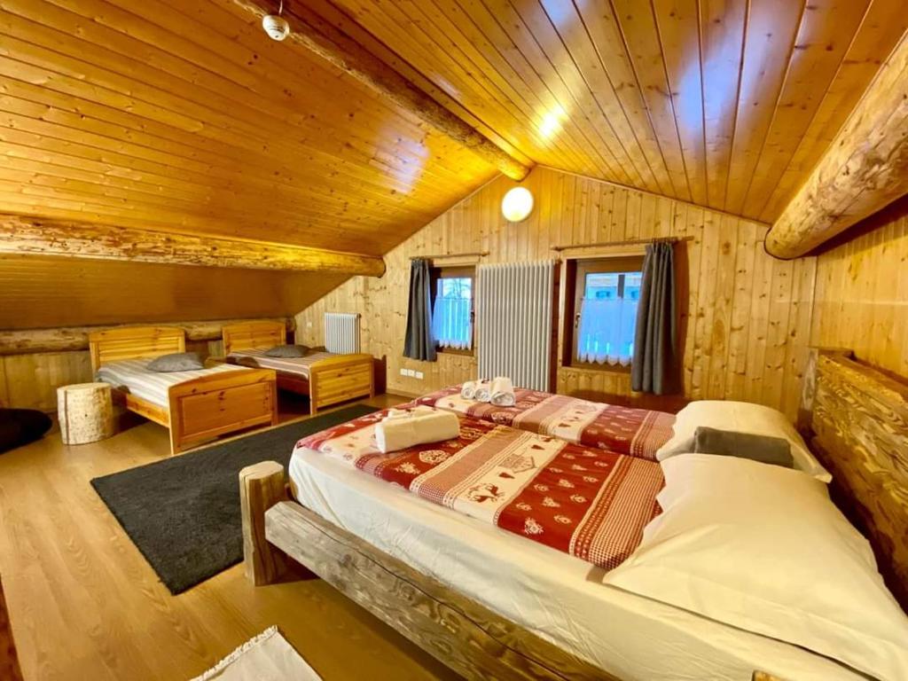 Postel nebo postele na pokoji v ubytování B&B Sass de Mura