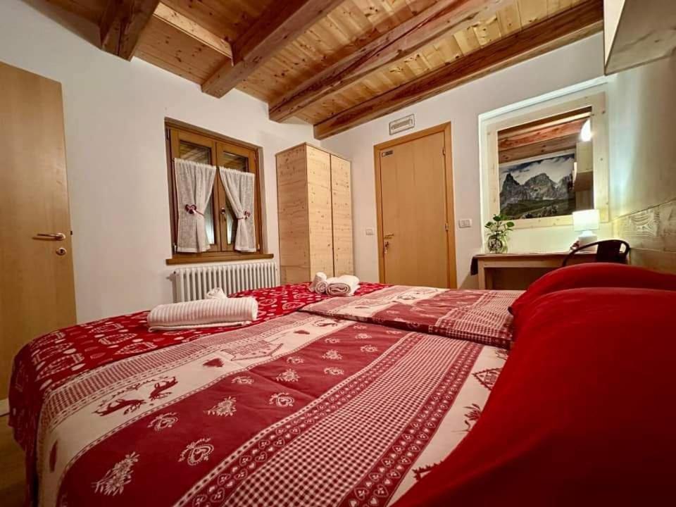 Postel nebo postele na pokoji v ubytování B&B Sass de Mura