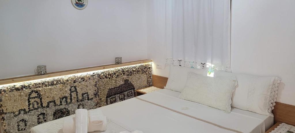 Postel nebo postele na pokoji v ubytování Guest House Emily