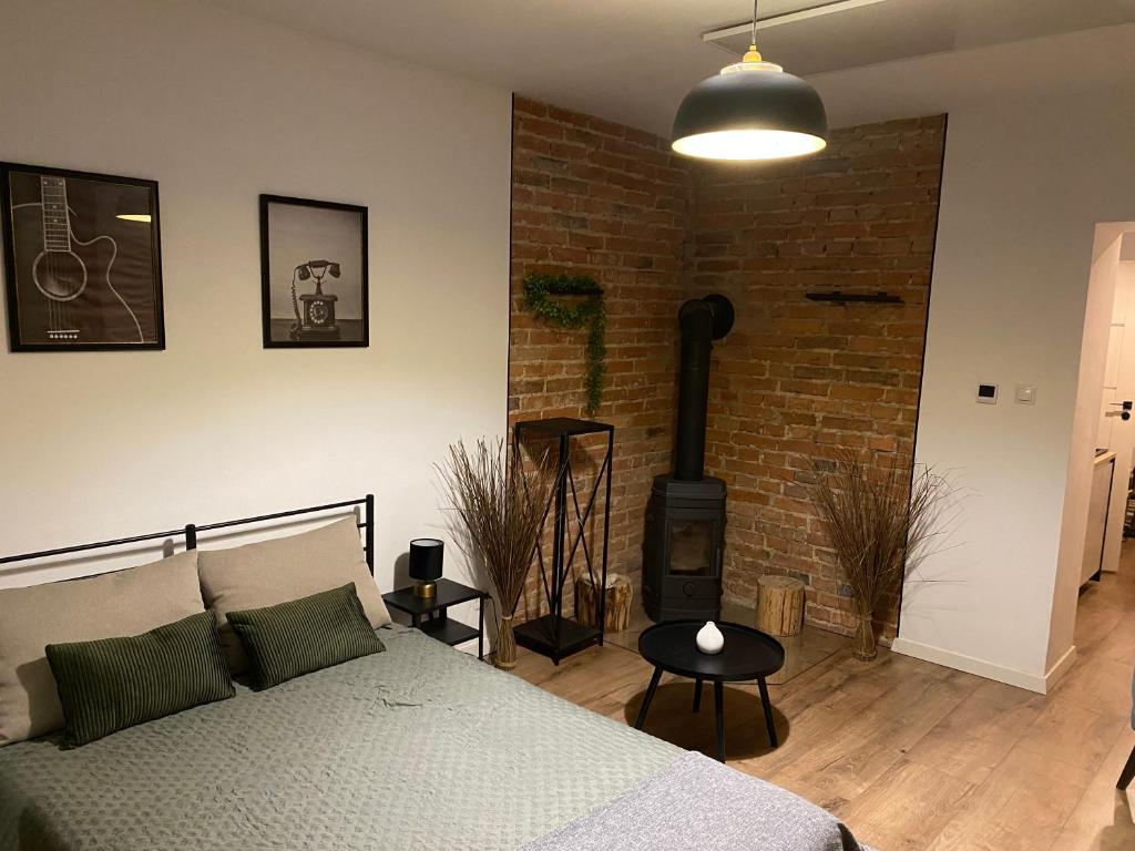 Postel nebo postele na pokoji v ubytování Apart Rembricz