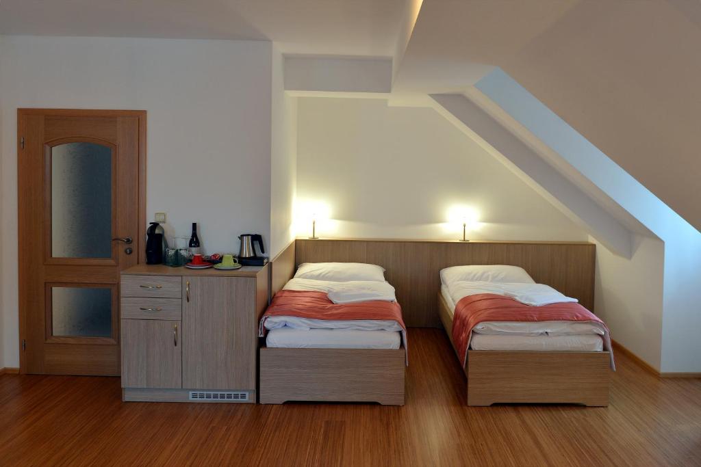 Postel nebo postele na pokoji v ubytování Resort Johanka