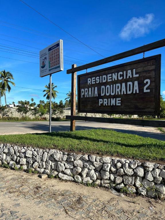a sign for a park in pala dombraince at Casa Praia BRISAMAR in Maragogi
