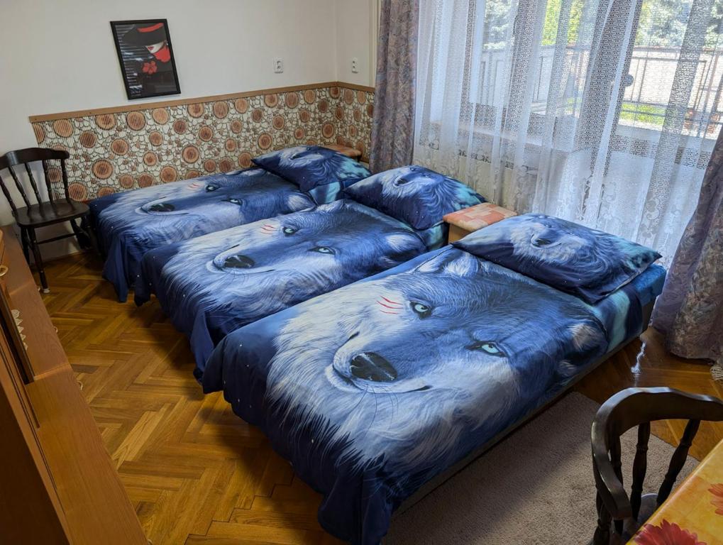 Postel nebo postele na pokoji v ubytování Vila Imagina
