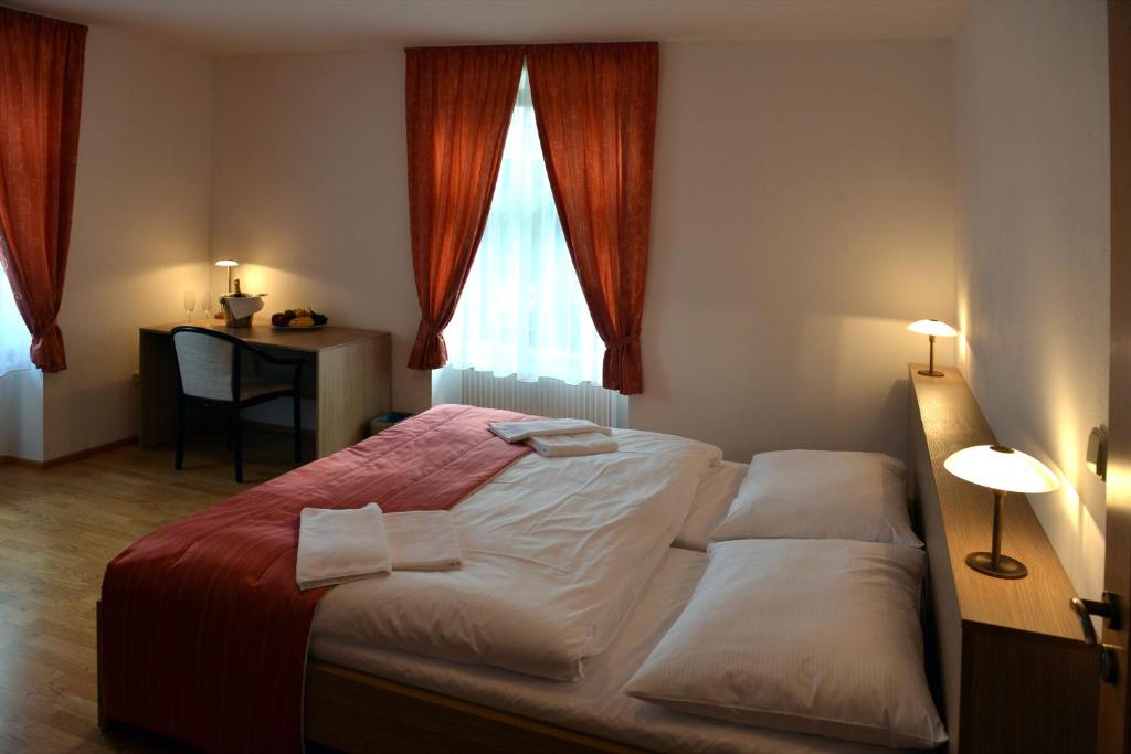 Postel nebo postele na pokoji v ubytování Resort Johanka