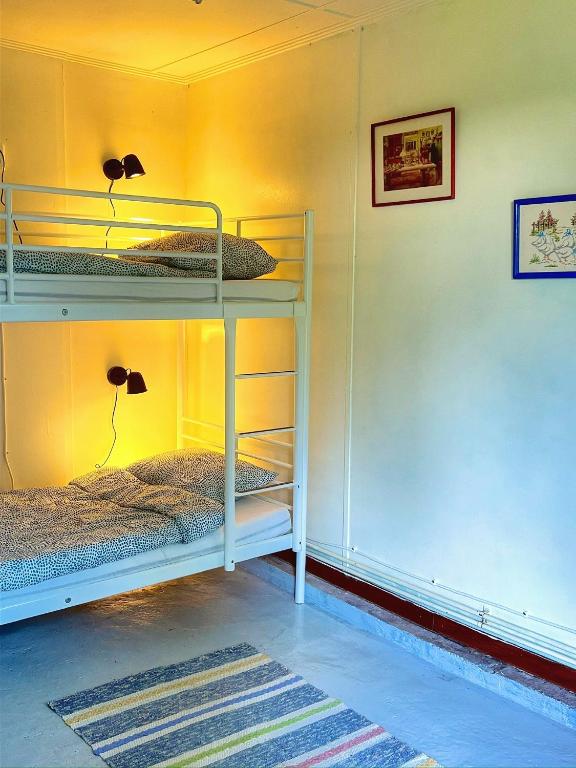 Postel nebo postele na pokoji v ubytování Hedehagens Hemlighet