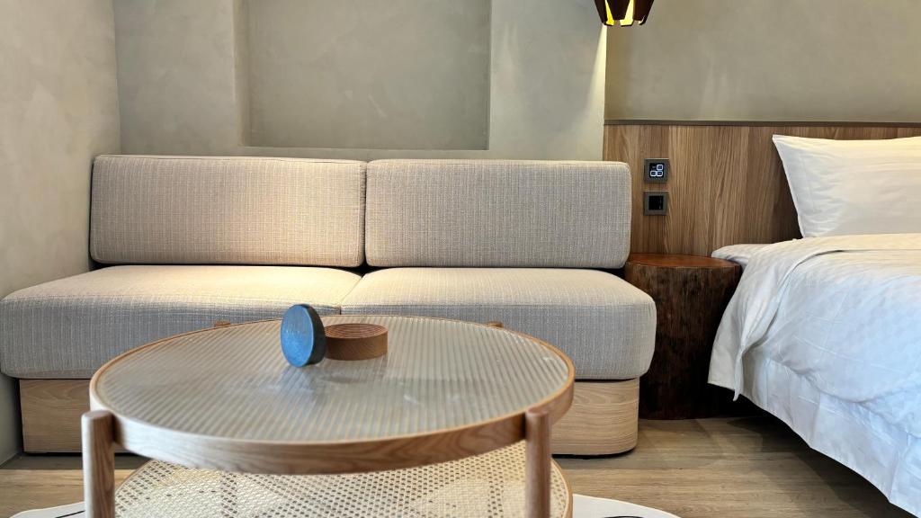 Postel nebo postele na pokoji v ubytování Hotel Initial-Tainan